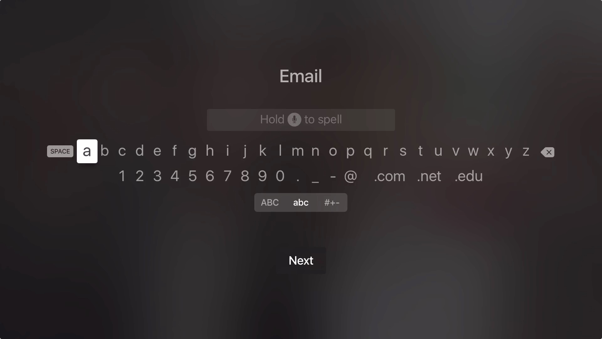 tvOS on-screen keyboard with a horizontally scrolling layout of letters, numbers, and symbols, designed for gesture-based input using a touch-enabled remote.