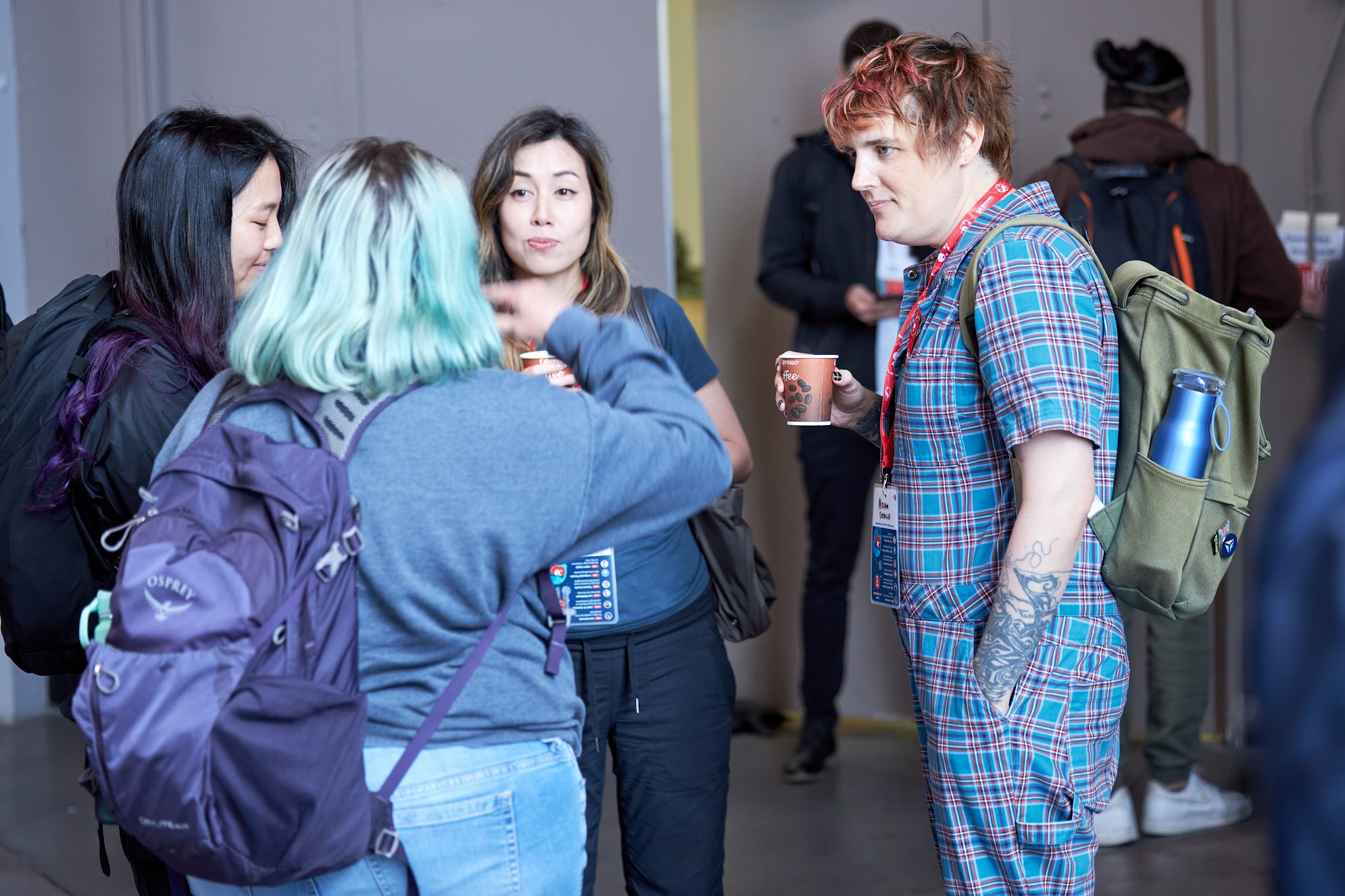 Miriam Suzanne talking to attendees