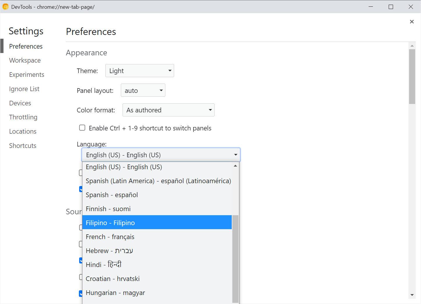 Screenshot of the settings panel in chrome devtools showing the language drop-down